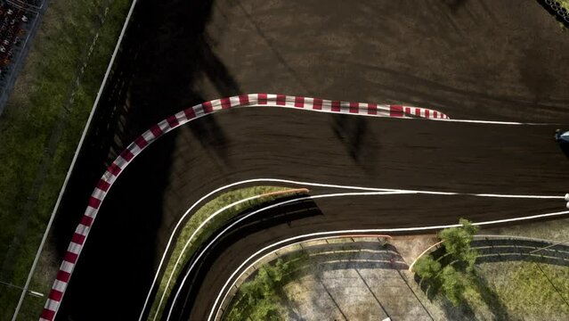 OVERHEAD Two modern race cars racing on a speedway 