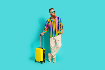 Full body length photo of cool tourist red hair charismatic man in stylish outfit holding yellow...