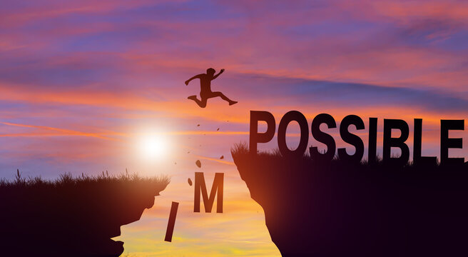 Silhouette man jumping over impossible and possible wording on cliffs with cloud sky and sunrise. Never give up, Success challenge, and Positive mindset Concept.