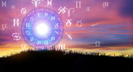 Astrological zodiac signs inside of horoscope circle. Sun over the zodiac wheel and Sunrise background. The power of the universe concept.