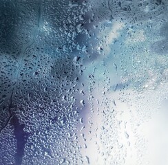 Rainy sky bad weather behind window glass..