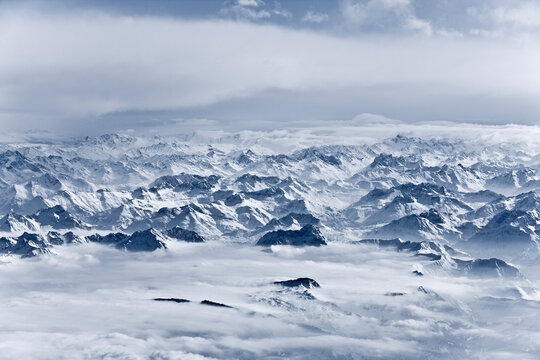 Aerial view over the alps out of an airplane.