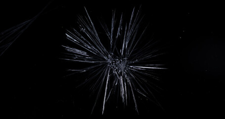 Fototapeta premium Freezing Of Ice Crystals On A Black Background