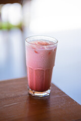 Red Velvet Drinks Milk in a Glass. Fresh Drink Smoothie Concept to Go. My favorite drink at the cafe