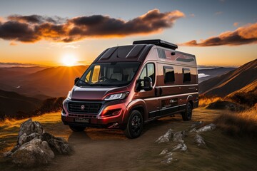 Modern red camper house on wheels in the mountains at sunset, summer travel concept