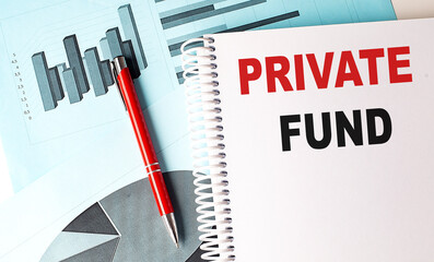 PRIVATE FUND text on a notebook with pen on a chart background