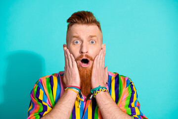 Photo of surprised shocked man wear stylish clothes hand touch cheeks wow news omg open mouth isolated on cyan color background - obrazy, fototapety, plakaty