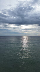 Aerial view of the sea and sky with clouds. Top view.