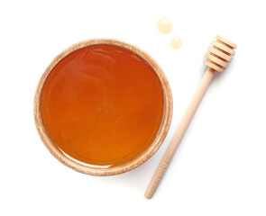 Tasty honey in bowl and dipper on white background, top view. Space for text