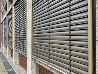 windows with lowered shutters