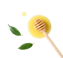 Wooden dipper with fresh honey and green leaves on white background, top view
