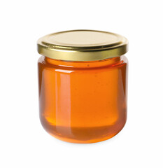 Tasty natural honey in glass jar isolated on white