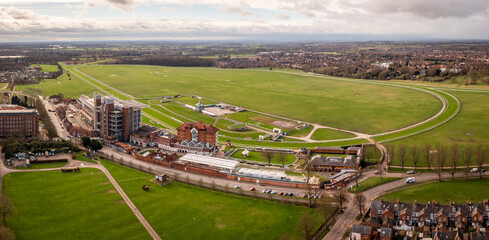 Aerial view above York Racecourse showing the whole circuit and buildings