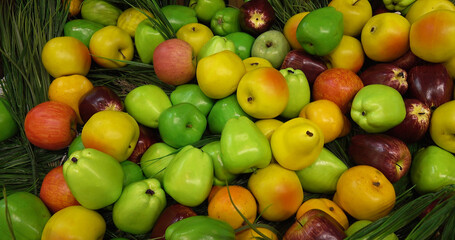 Apples and pears. A vivid close-up of colorful fruits. Ideal for the concept of a healthy lifestyle