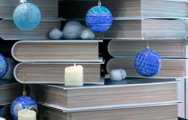 Background of books and Christmas balls.
