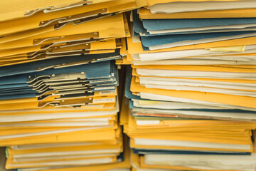 Still life of stacks of old documents and folders ready to be shredded and thrown away. Munich, Germany