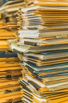 Still life of stacks of old documents and folders ready to be shredded and thrown away. Munich, Germany