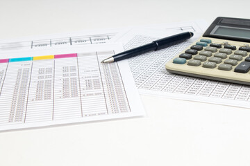 Financial Charts, graphs, coins, calculator on isolated white background.