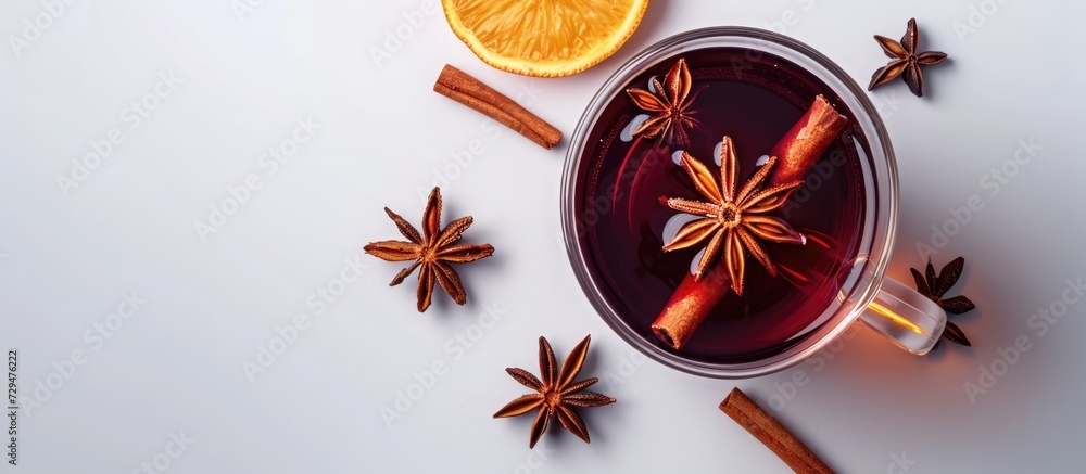 Sticker Isolated top view of hot spiced wine in a glass.