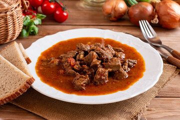 Traditional Czech Goulash meal on plate on table