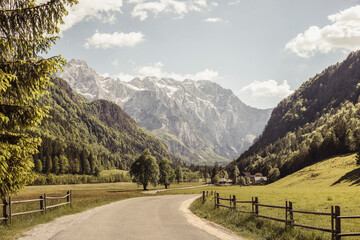 View of mountains and valley with road leading to the mountains. Logarska Dolina, Slovenia