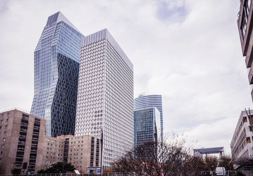Urban landscapes of skyscrapers and blue sky. Paris, France