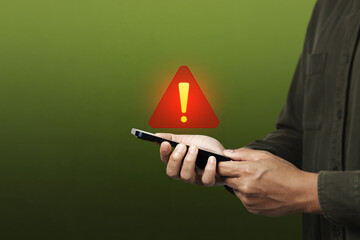 Mobile security protection or warning notification. A man touch mobilephone showing warning access...