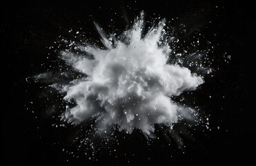 a white puff of powder on a black background in