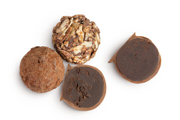 A variety of different truffles Isolated on a white background. Top view. Flat lay.