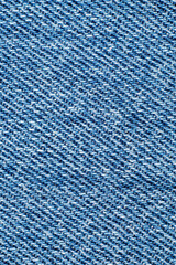 Blue denim jeans texture close-up fabric diagonal pattern