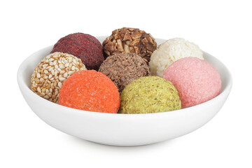 A variety of different truffles in a ceramic bowl Isolated on a white background