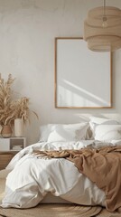 a cozy bedroom with a wall mockup featuring an empty frame, creating a serene atmosphere.