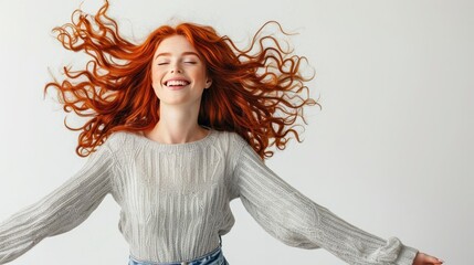 girl with Flowing Auburn Hair in a light color Top Against a Light Background - obrazy, fototapety, plakaty