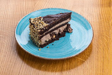 Chocolate tart on a blue plate