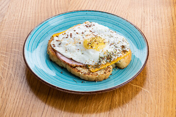 French toast with fried egg, ham and cheddar cheese
