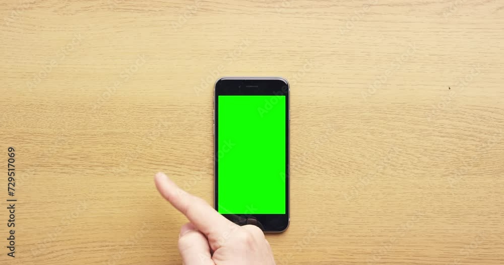 Aufkleber hands, phone and green screen on table in closeup with typing, scroll and click on ui for promotion.