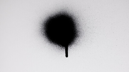 Black Spray Paint On A White Background