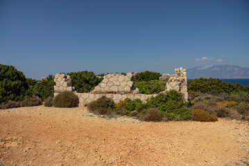 Greece, Zakynthos, Road to skinari lighthouse at zakynthos island north cape. Ancient ruins on...