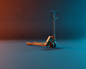 Yellow hand forklift in blue and red coloured light. Studio shot.