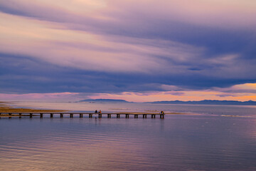 Fototapeta premium Ebro Delta, seen from Trabucador beach, with the footbridge in the background on a cloudy day