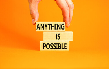 Anything is possible symbol. Concept words Anything is possible on beautiful wooden blocks....