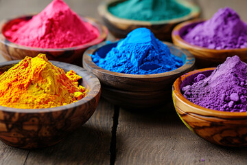Colorful Indian powder paints, High angle view of multi colored powder paints on table. . Organic Gulal colors in bowl for Holi festival, Hindu tradition festive. - Powered by Adobe