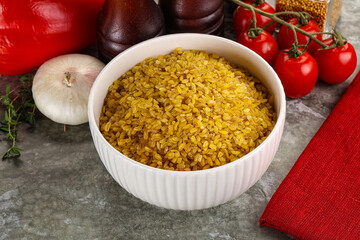 Dry wheat bulgur cereal heap