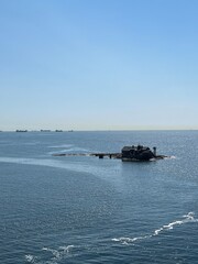 rocky island with a little cottage