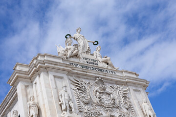 Close up to the magnificent architecture of Rua Augusta Arch viewed from Praca do Comercio (Commerce Square) in Lisbon, Portugal.