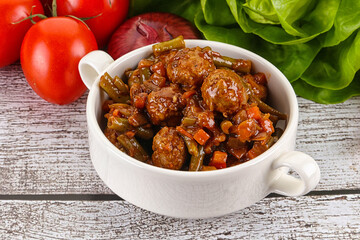 Meatball with vegetables and spices