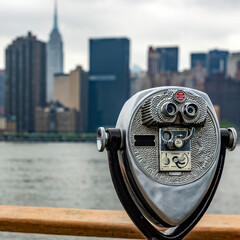 A binocular on Long Island which is an island that extends through New York (USA) and from where...
