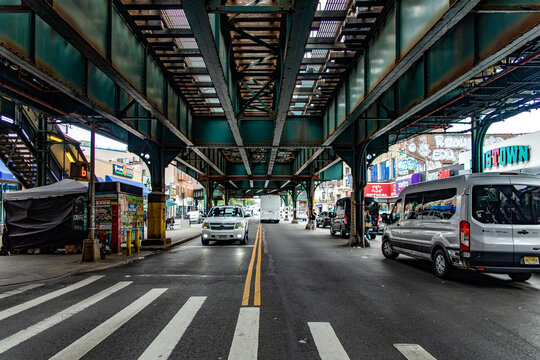New York, USA; January 3, 2024: One of the sections of the Grand Concourse Avenue in the Bronx borough, with subway rails in the air in New York City.