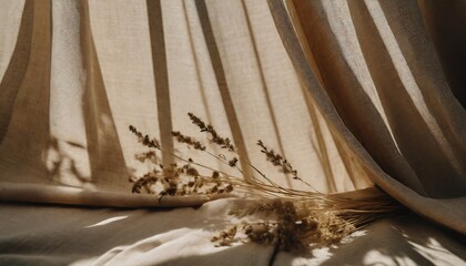 Obraz na płótnie Canvas aesthetic boho neutral floral background abstract sunlight shadows on beige linen curtain and meadow grass elegant business interior or wedding design template