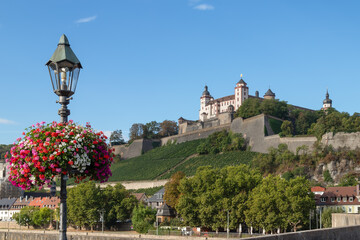 Fototapeta na wymiar Old Main Bridge and Fort Marienberg in the historic city of Würzburg.